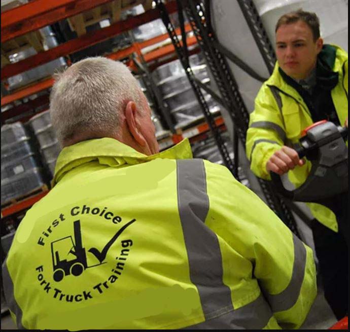 First Choice Fork Truck instructors providing on-site forklift training